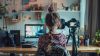 Young girl doing video editing at computer, likely using Viddyoze to create amazing animations.
