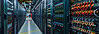 Photo of a datacenter with web servers in aisles. A2 Hosting Shared Web Hosting is on Web Servers that are fast and reliable - just like these.